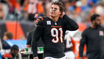 Cincinnati Bengals defensive end Trey Hendrickson (91) watches a replay as the Detroit Lions celebrate a touchdown in the fourth quarter of the NFL Week 5 game between the Cincinnati Bengals and the Detroit Lions at Paycor Stadium in downtown Cincinnati on Sunday, Oct. 5, 2025. The Bengals continued a losing streak, falling 37-24 to the Lions.