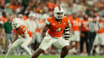 Oct 17, 2025; Miami Gardens, Florida, USA; Miami Hurricanes defensive lineman Rueben Bain Jr. (4) plays his position against the Louisville Cardinals during the third quarter at Hard Rock Stadium. Mandatory Credit: Sam Navarro-Imagn Images