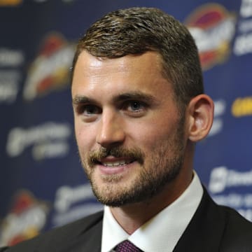 Aug 26, 2014; Independence, OH, USA; Cleveland Cavaliers player Kevin Love talks to the media at Cleveland Clinic Courts. Mandatory Credit: David Richard-Imagn Images