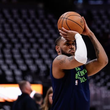 May 14, 2024; Denver, Colorado, USA; Minnesota Timberwolves guard Monte Morris (23) warms up before game five against the Denver Nuggets in the second round for the 2024 NBA playoffs at Ball Arena. Mandatory Credit: Isaiah J. Downing-USA TODAY Sports