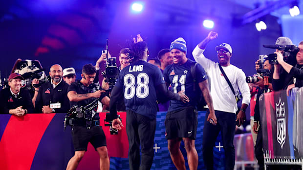 Dallas Cowboys wide receiver CeeDee Lamb (88) and linebacker Micah Parsons (11) celebrate during the NFL Pro Bowl Skills Comp