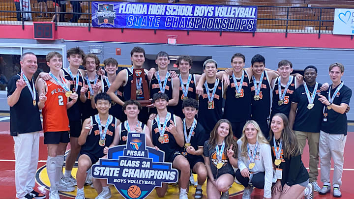 Winter Park players, coaches and staff gather after winning the Class 3A volleyball state championship Saturday at Polk State College. Winter Park players, coaches and staff gather after winning the Class 3A volleyball state championship Saturday at Polk State College.