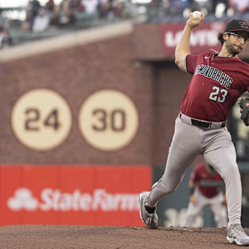 Sep 4, 2024; San Francisco, California, USA;  Arizona Diamondbacks pitcher Zac Gallen (23) pitches during the first inning against the San Francisco Giants at Oracle Park. Mandatory Credit: Stan Szeto-Imagn Images