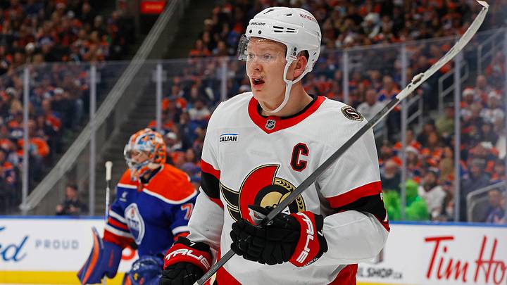 Dec 22, 2024; Edmonton, Alberta, CAN; Ottawa Senators forward Brady Tkachuk (7) looks for a loose puck against the Edmonton Oilers at Rogers Place. Mandatory Credit: Perry Nelson-Imagn Images