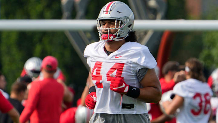 Aug 4, 2022; Columbus, OH, USA;  Ohio State Buckeyes defensive end J.T. Tuimoloau (44) runs during the first fall football practice at the Woody Hayes Athletic Center. Mandatory Credit: Adam Cairns-The Columbus Dispatch

Ohio State Football First Practice