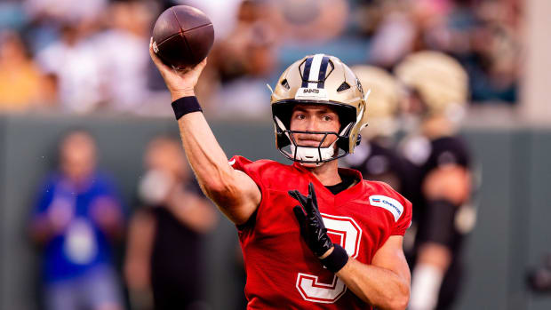 New Orleans Saints quarterback Jake Haener (3) passes during practice at Yulman Stadium  