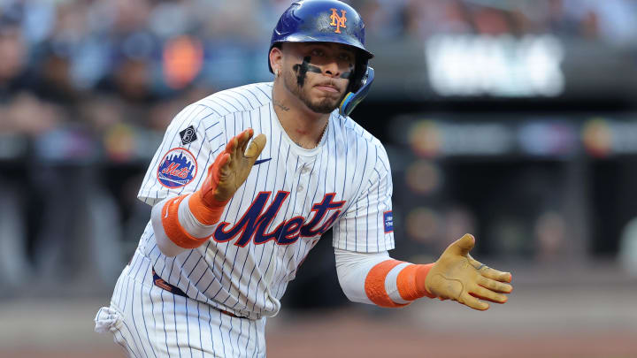 Jun 25, 2024; New York City, New York, USA; New York Mets catcher Francisco Alvarez (4) reacts after drawing a walk during the first inning against the New York Yankees at Citi Field. Mandatory Credit: Brad Penner-USA TODAY Sports