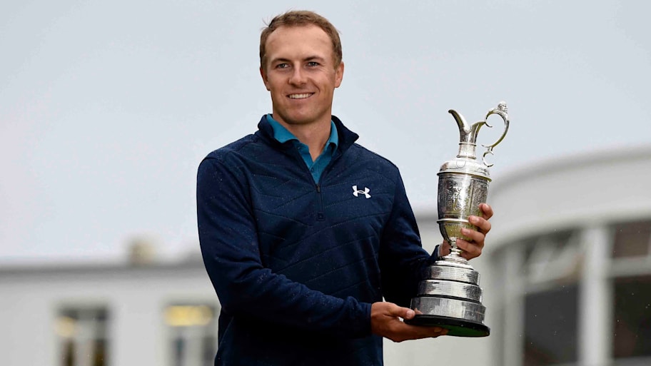 Jordan Spieth poses with the Claret Jug after winning the 2017 British Open.
