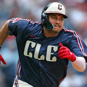 Cleveland Guardians first baseman Josh Naylor (22) runs out a hit to right field during the fifth inning of an MLB game at Progressive Field, Thursday, June 20, 2024, in Cleveland, Ohio.