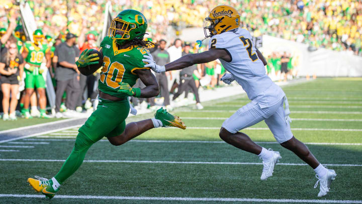 Oregon Ducks running back Jordan James carries the ball for a touchdown as the Oregon Ducks host the Idaho Vandals Saturday, Aug. 31, 2024 at Autzen Stadium in Eugene, Ore.