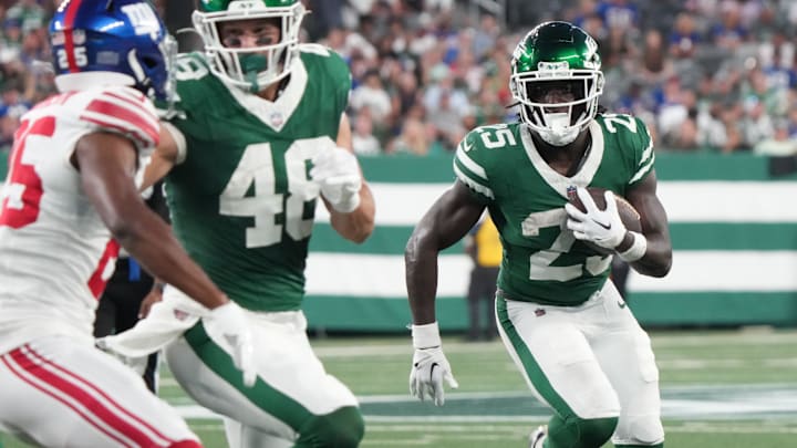 East Rutherford, NJ -- August 24, 2024 -- Israel Abanikanda of the Jets runs the ball in the first half. The New York Giants and New York Jets meet at MetLife Stadium in the final preseason game of the 2024 season for both teams.