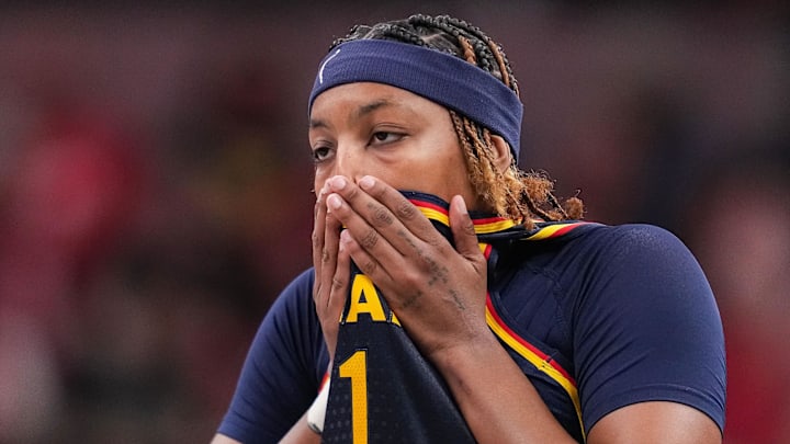 Sep 15, 2024; Indianapolis, Indiana, USA; Indiana Fever forward NaLyssa Smith (1) wipes off her face at Gainbridge Fieldhouse. Mandatory Credit: Grace Hollars/USA TODAY Network via Imagn Images