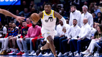 Jan 17, 2025; New Orleans, Louisiana, USA; Utah Jazz guard Isaiah Collier (13) brings the ball up court against the New Orleans Pelicans during the second half at Smoothie King Center. Mandatory Credit: Stephen Lew-Imagn Images