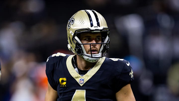 Sep 8, 2024; New Orleans, Louisiana, USA;  New Orleans Saints quarterback Derek Carr (4) against the Carolina Panthers during the pregame at Caesars Superdome. Mandatory Credit: Stephen Lew-Imagn Images