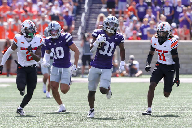 Kansas State Wildcats running back DJ Giddens (31) runs for a 66-yard touchdown.