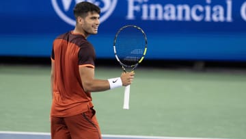 Aug 15, 2024; Cincinnati, OH, USA ; Carlos Alcaraz of Spain reacts to a point during his match against Gael Monfils of France on day four of the Cincinnati Open. 