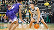 Oregon guard Jackson Shelstad moves the ball up the court as the Oregon Ducks host the Washington Huskies Tuesday, Jan. 21, 2025, at Matthew Knight Arena in Eugene, Ore.