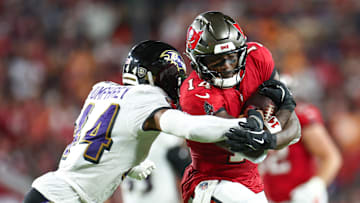 Tampa Bay Buccaneers wide receiver Chris Godwin is pressured by Baltimore Ravens.