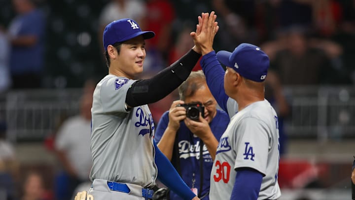 Shohei Ohtani and Dave Roberts after the Dodgers' 9–0 win over the Braves on Sept. 16, 2024. Shohei Ohtani and Dave Roberts after the Dodgers' 9–0 win over the Braves on Sept. 16, 2024.