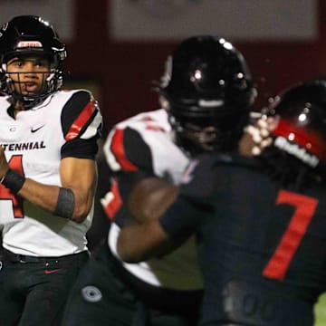 Centennial Huskies Quarterback Husan Longstreet (4) prepares to pass the ball at Liberty High School on Sept. 21, 2024, in Peoria.