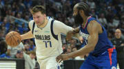  Apr 21, 2024; Los Angeles, California, USA; Dallas Mavericks guard Luka Doncic (77) is defended by