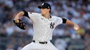 Sep 30, 2025; Bronx, New York, USA; New York Yankees starting pitcher Max Fried (54) pitches against the Boston Red Sox during the first inning of game one of the Wildcard round of the 2025 MLB playoffs at Yankee Stadium. Mandatory Credit: Brad Penner-Imagn Images