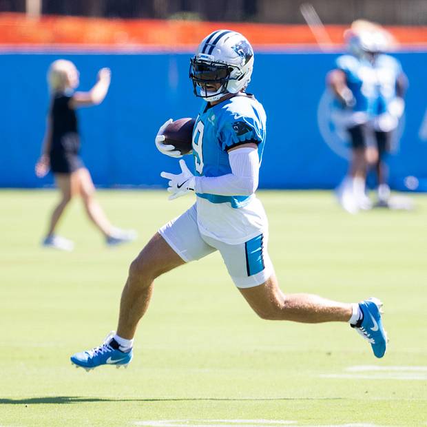 Carolina Panthers wide receiver Adam Thielen runs after a catch during practice at training camp.