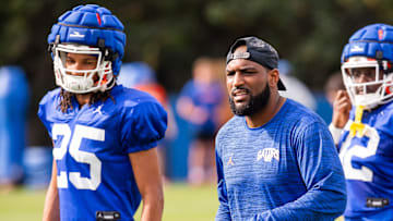 New Florida secondary coach Will Harris directs his defensive backs during the Florida Gators as they held their final open Spring football practice before the Orange and Blue Game at Sanders Practice Fields in Gainesville, FL on Tuesday, April 9, 2024. [Doug Engle/Gainesville Sun]