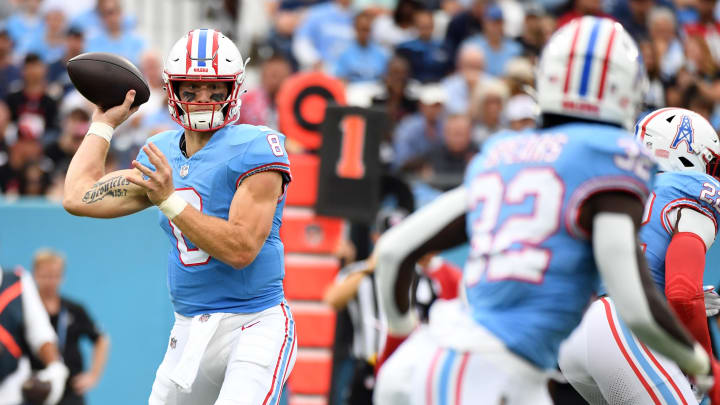 Oct 29, 2023; Nashville, Tennessee, USA; Tennessee Titans quarterback Will Levis (8) completes a pass to running back Tyjae Spears (32) during the first half against the Atlanta Falcons at Nissan Stadium