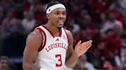Louisville Cardinals guard Ryan Conwell (3) reacts after his team scores against the Indiana Hoosiers during a game Saturday, Dec. 6, 2025, at Gainbridge Fieldhouse in Indianapolis. Louisville defeated Indiana 87-78.