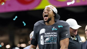 Philadelphia Eagles running back Saquon Barkley (26) celebrates after defeating the Kansas City Chiefs during Super Bowl LIX at Ceasars Superdome.