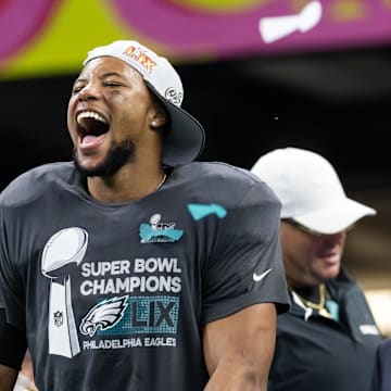 Philadelphia Eagles running back Saquon Barkley (26) celebrates after defeating the Kansas City Chiefs during Super Bowl LIX at Ceasars Superdome.