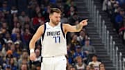 Dec 15, 2024; San Francisco, California, USA; Dallas Mavericks guard Luka Doncic (77) gestures after scoring against the Golden State Warriors during the first quarter at Chase Center. Mandatory Credit: Darren Yamashita-Imagn Images