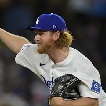 Apr 25, 2025; Los Angeles, California, USA;  Los Angeles Dodgers relief pitcher Noah Davis (56) delivers to the plate in the seventh inning Pittsburgh Pirates at Dodger Stadium. Mandatory Credit: Jayne Kamin-Oncea-Imagn Images