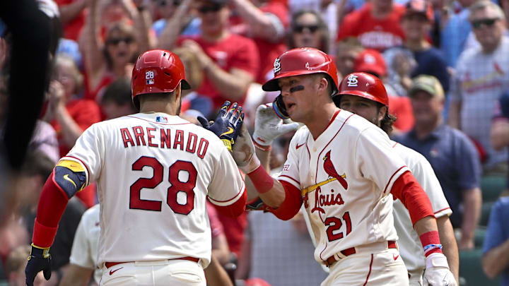 May 6, 2023; St. Louis, Missouri, USA;  St. Louis Cardinals third baseman Nolan Arenado (28) is congratulated by right fielder Lars Nootbaar (21) after hitting a two run home run against the Detroit Tigers during the fifth inning at Busch Stadium. Mandatory Credit: Jeff Curry-Imagn Images