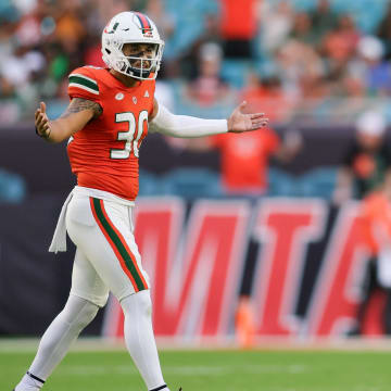 Oct 28, 2023; Miami Gardens, Florida, USA; Miami Hurricanes kicker Andres Borregales (30) reacts after scoring a field goal against the Virginia Cavaliers during the fourth quarter at Hard Rock Stadium. Mandatory Credit: Sam Navarro-USA TODAY Sports