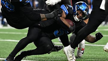 Oct 20, 2025; Detroit, Michigan, USA; Detroit Lions running back David Montgomery (5) rushes the ball against the Tampa Bay Buccaneers during the second half at Ford Field.