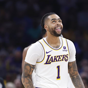 Dec 23, 2023; Oklahoma City, Oklahoma, USA; Los Angeles Lakers guard D'Angelo Russell (1) smiles after a play against the Oklahoma City Thunder during the second half at Paycom Center. Mandatory Credit: Alonzo Adams-Imagn Images