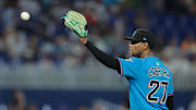 Sep 28, 2025; Miami, Florida, USA; Miami Marlins starting pitcher Edward Cabrera (27) catches the baseball against the New York Mets during the first inning at loanDepot Park.