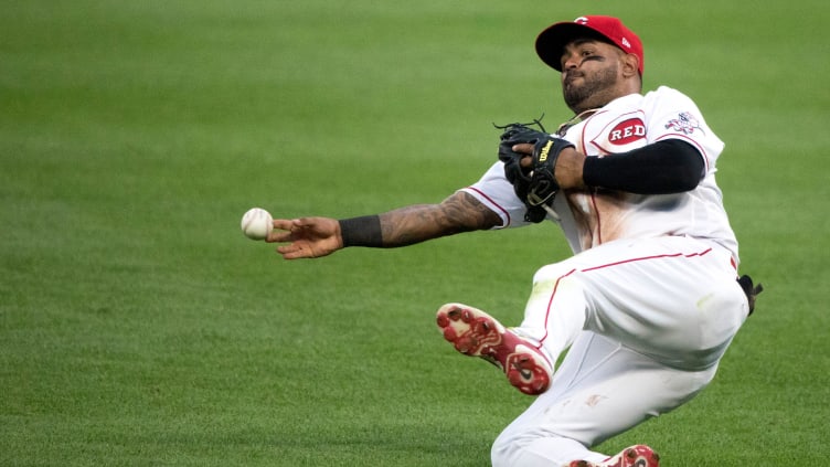 Cincinnati Reds second baseman Christian Colon (29) throws to first base.