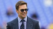 Oct 12, 2025; Baltimore, Maryland, USA; Fox Sports announcer Tom Brady looks on before the game between the Baltimore Ravens and the Los Angeles Rams at M&T Bank Stadium.