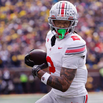 Nov 25, 2023; Ann Arbor, Michigan, USA;  Ohio State Buckeyes wide receiver Emeka Egbuka (2) makes a reception for a touchdown in the first half against the Michigan Wolverines at Michigan Stadium.