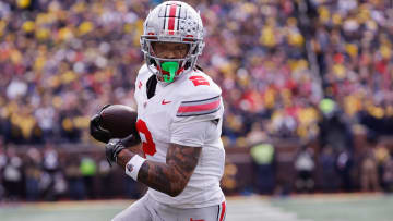 Nov 25, 2023; Ann Arbor, Michigan, USA;  Ohio State Buckeyes wide receiver Emeka Egbuka (2) makes a reception for a touchdown in the first half against the Michigan Wolverines at Michigan Stadium. Mandatory Credit: Rick Osentoski-USA TODAY Sports