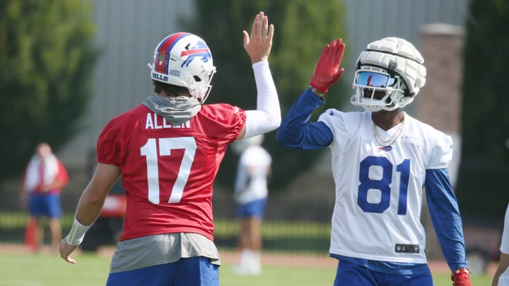 Bills quarterbacks Josh Allen gives a high-five to new wide receiver Marquez Valdez-Scantling during the opening day of Buffalo Bills training camp.