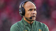 Oct 25, 2025; Cincinnati, Ohio, USA;  Baylor Bears head coach Dave Aranda works the sideline during the game against the Cincinnati Bearcats in the second half at Nippert Stadium. Mandatory Credit: Aaron Doster-Imagn Images