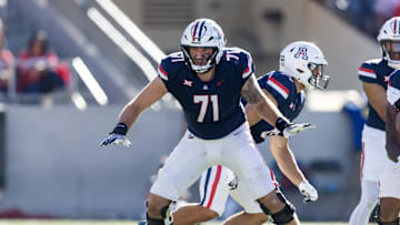 Nov 8, 2025; Tucson, Arizona, USA; Arizona Wildcats offensive lineman Tristan Bounds (71) against the Kansas Jayhawks at Arizona Stadium. Mandatory Credit: Mark J. Rebilas-Imagn Images