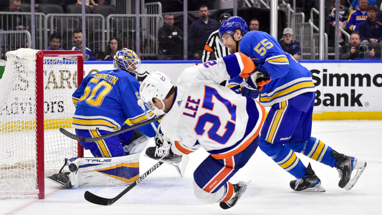 Apr 9, 2022; St. Louis, Missouri, USA;  New York Islanders left wing Anders Lee (27) falls to the