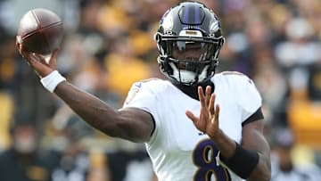 Nov 17, 2024; Pittsburgh, Pennsylvania, USA;  Baltimore Ravens quarterback Lamar Jackson (8) passes against the Pittsburgh Steelers during the first quarter at Acrisure Stadium. Mandatory Credit: Charles LeClaire-Imagn Images