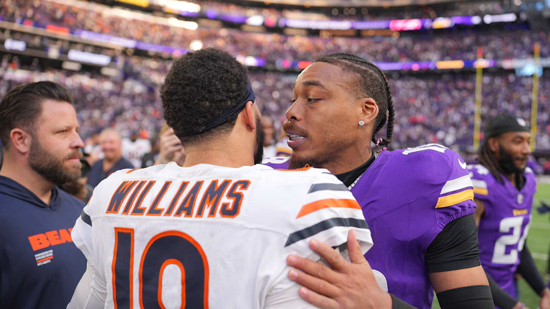Nov 16, 2025; Minneapolis, Minnesota, USA; Chicago Bears quarterback Caleb Williams (18) greets Minnesota Vikings wide receiver Justin Jefferson (18) following a game at U.S. Bank Stadium. Mandatory Credit: Brad Rempel-Imagn Images