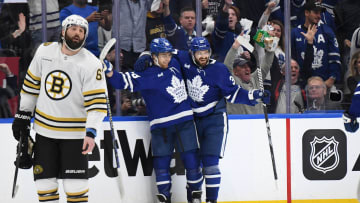 May 2, 2024; Toronto, Ontario, CAN;   Boston Bruins forward Patrick Maroon (61) reacts as Toronto Maple Leafs forward William Nylander (88) celebrates his goal with defenseman Timothy Liljegren (37) in the second period in game six of the first round of the 2024 Stanley Cup Playoffs at Scotiabank Arena. Mandatory Credit: Dan Hamilton-USA TODAY Sports